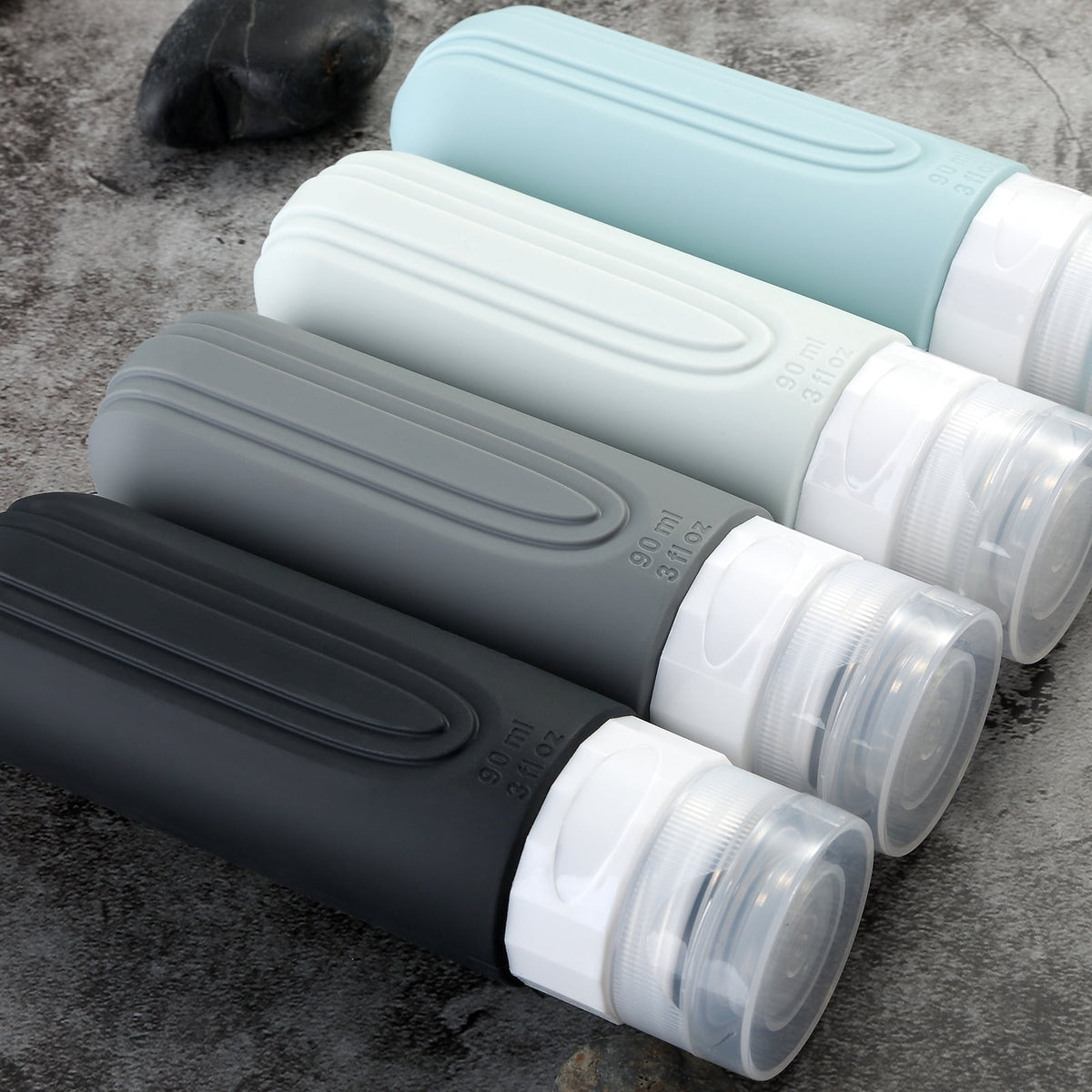 Ultimate Travel Bottles for Toiletries - TSA Approved 3oz Silicone Containers, Leak-Proof & Refillable, Perfect for Shampoo, Conditioner & Lotion (4 Pack)