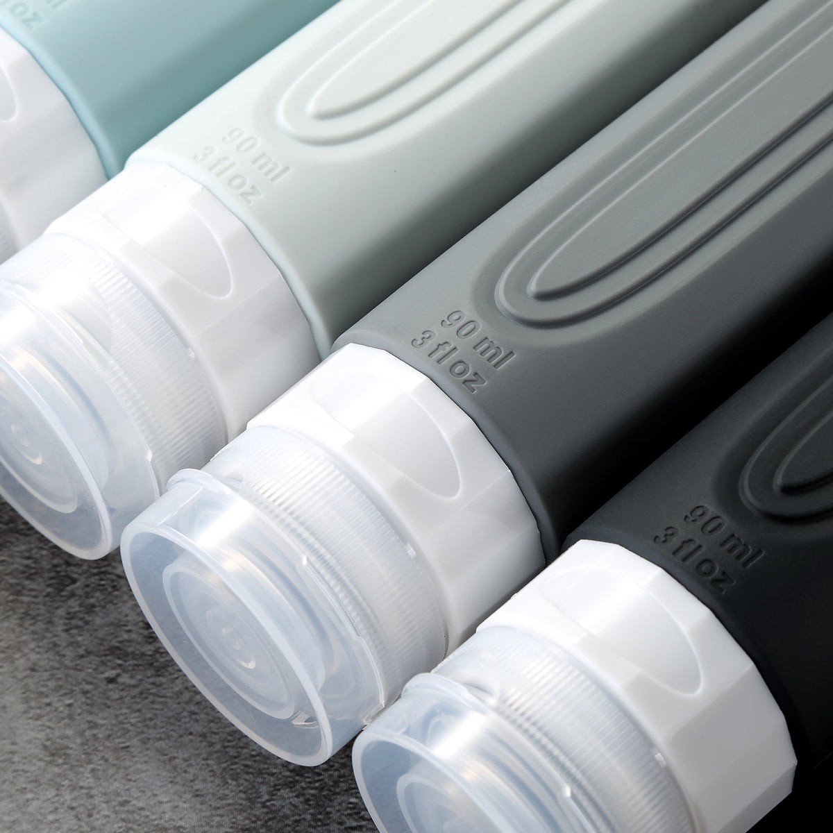 Ultimate Travel Bottles for Toiletries - TSA Approved 3oz Silicone Containers, Leak-Proof & Refillable, Perfect for Shampoo, Conditioner & Lotion (4 Pack)
