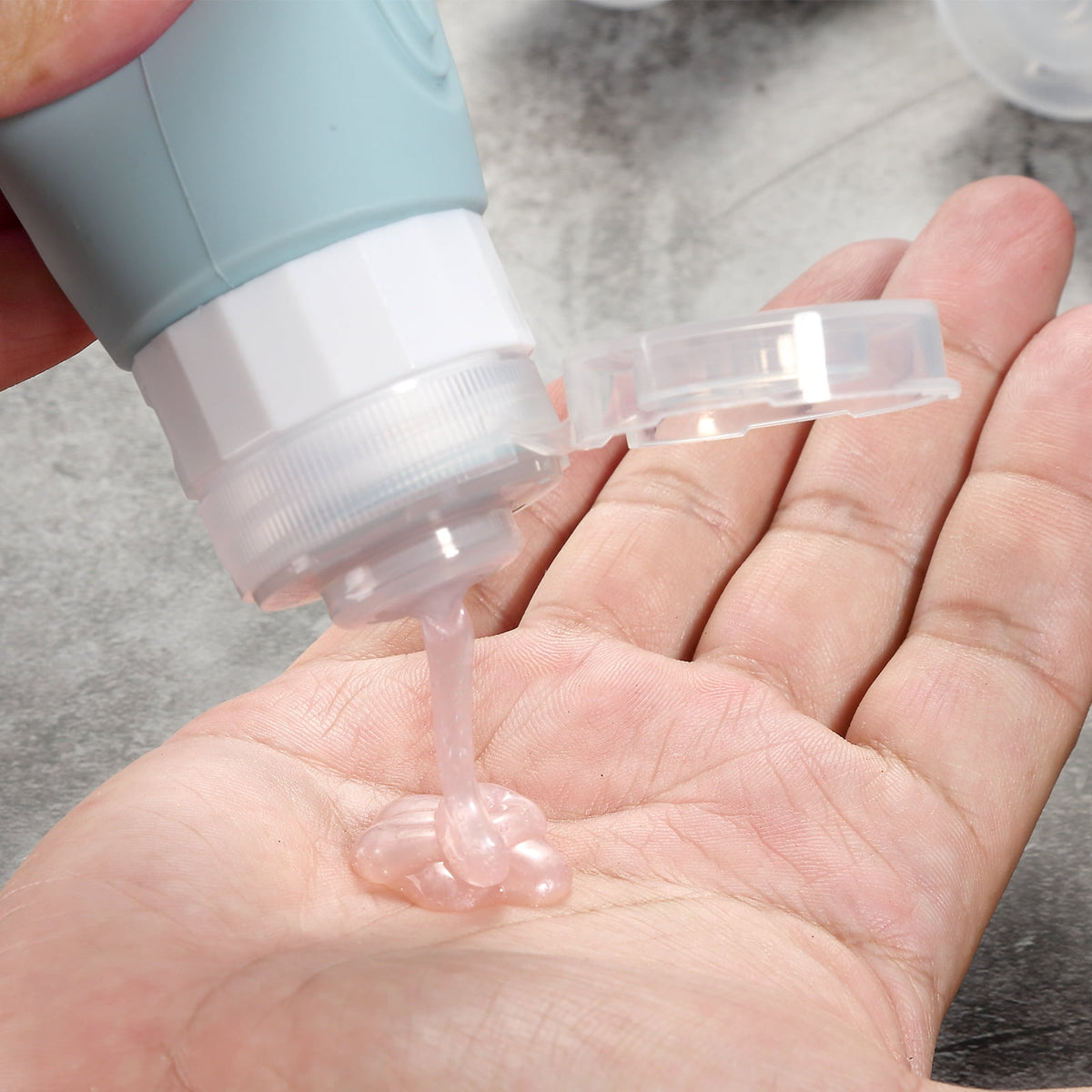 Ultimate Travel Bottles for Toiletries - TSA Approved 3oz Silicone Containers, Leak-Proof & Refillable, Perfect for Shampoo, Conditioner & Lotion (4 Pack)